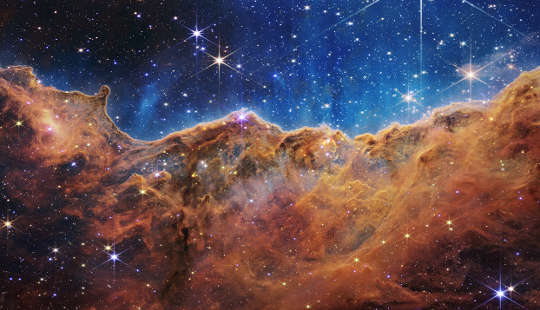 "Cosmic Cliffs" in the Carina Nebula, where new stars are birthed. 